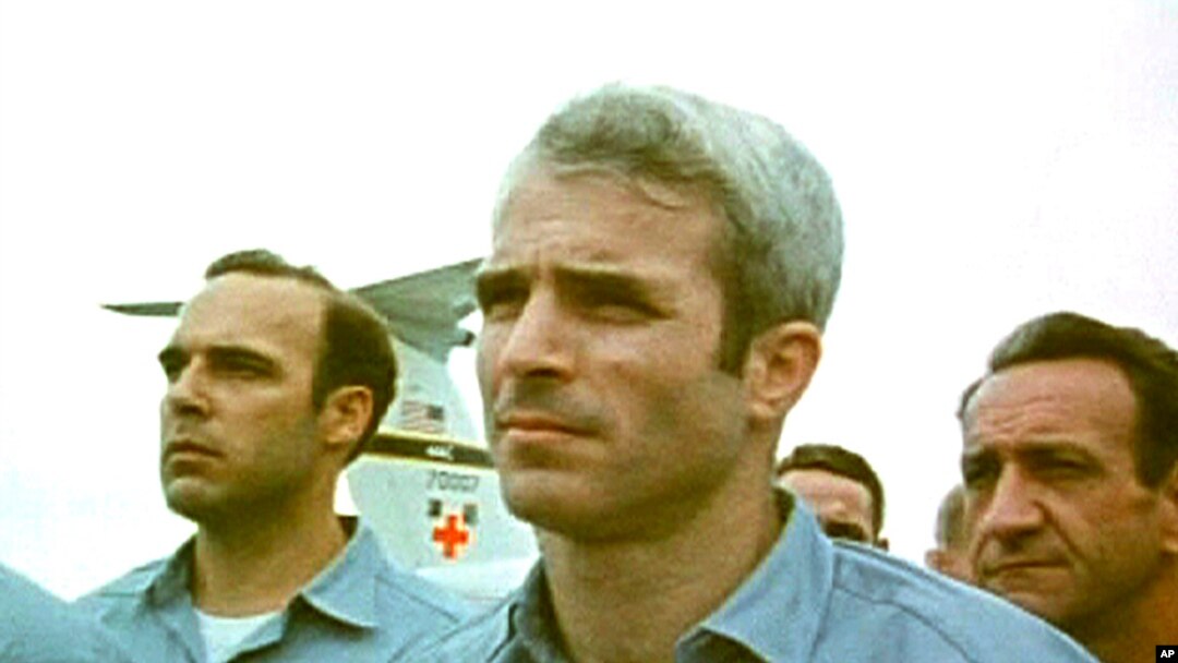 This still from video obtained exclusively by Associated Press shows then-prisoner of war John McCain, standing with other POWs as they were released by the North Vietnamese in Hanoi on March 14, 1973.
