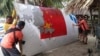 中国海警船在南中国海有争议水域强行抢走菲海军打捞的火箭碎片 
 
