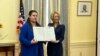 Посолка України у США Оксана Маркарова вручає диплом «Почесний доктор Національної академії наук України» президентці Національної академії наук США (NAS) Марші Макнат 