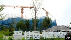 资料照片： 2023年8月17日，北京郊区正在建设中的碧桂园世界城项目。（美联社照片）
