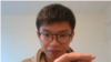 已经解散的香港学生组织“学生动源”前召集人钟翰林在英国时间12月27日晚上到达伦敦并接受美国之音访问 （美国之音郑乐捷）
