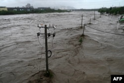 北京门头沟区暴雨成灾永定河泛滥。(2023年7月31日)