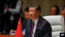 资料照 - 习近平出席杭州亚运会开幕式。