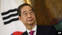 韩国总理韩德洙（Han Duck-soo）担任韩国代总统，代理尹锡悦总统料理国事。资料照