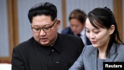 资料照：朝鲜领导人金正恩和他的妹妹金与正