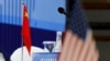 资料照：联合国安理会五个常任理事国--中国、法国、俄罗斯、英国和美国在北京举行相关《不扩散核武器条约》的会议会场上的中美两国国旗。 （2019年1月30日）
