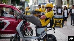 中国国家统计局2023年8月31日公布的报告显示服务业景气下滑。（美联社资料图）