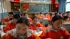 资料照片：2021年6月1日，学生们在那曲第二高级中学上汉语课。这所位于西藏自治区的中学是一所面向藏北学生的公立寄宿学校。