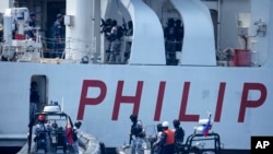 菲律宾、美国和日本的海岸警卫队在菲律宾海岸外举行海岸防卫联合演习。（2023年6月6日）（美联社）
