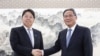 日本外相一天见三位中国高官 中方促日本勿“为虎作伥”助美制华
