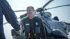Фото: Канцлер Німеччини Олаф Шольц на фоні гелікоптера Sea King, dpa pool via AP 