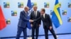 Президент Туреччини Реджеп Таїп Ердоган, Генеральний секретар НАТО Єнс Столтенберг, Прем’єр-міністр Швеції Ульф Крістерссон.