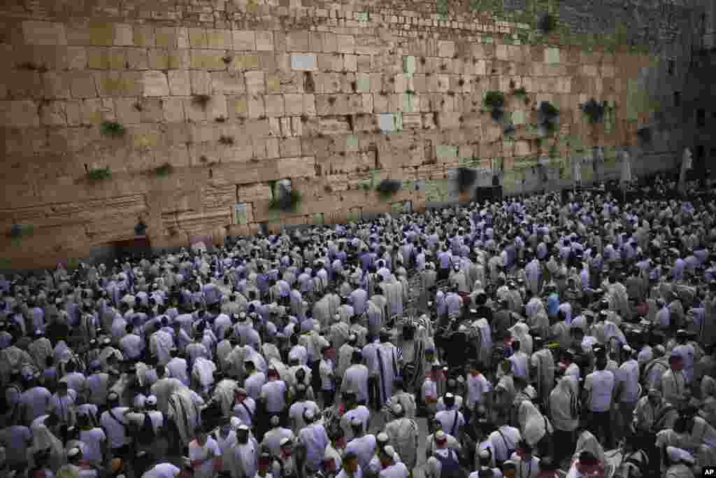 Jewish men during "Jerusalem Day," an Israeli holiday celebrating the capture of the Old City during the 1967 Mideast war, at the Western Wall, the holiest site where Jews can pray in the Old City of Jerusalem.