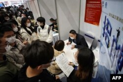 资料照：湖北省武汉市举办的一个招聘会（2021年3月10日）