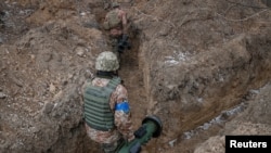 Фото: український військовослужбовець із "Джавеліном", березень 2022 року