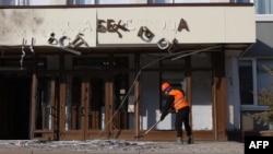 Наслідки атаки дрона по мерії у Бєлгороді, 12 березня 2024. Photo by STRINGER / AFP