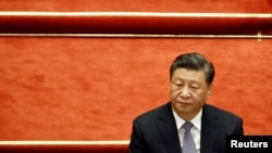 中国领导人习近平在北京人大会堂举行的全国政协十三届五次会议开幕式上。（2022年3月4日）