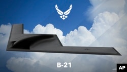 该照片是美国空军公布的一架最新亮相的远程战略轰炸机B-21的模拟图。模拟图由美联社提供。