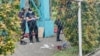 马尼拉警察在一处犯罪现场调查（资料照，2022年7月24日）