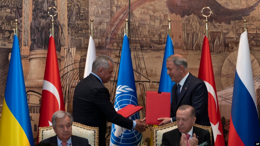 Turkish President Recep Tayyip Erdogan, right, and U.N. Secretary General Antonio Guterres lead a signing ceremony at Dolmabahce Palace in Istanbul, Turkey, Friday, July 22, 2022.