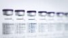 FILE - Empty vials to be filled with the Pfizer/BioNTech Comirnaty COVID-19 vaccine are seen at a production facility in Reinbek, near Hamburg, Germany, April 30, 2021.