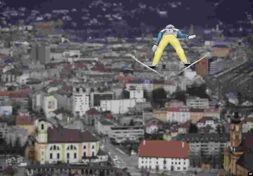 Switzerland's Gregor Deschwanden makes an attempt in the qualification for the third stage of the Four Hills Ski Jumping event at the ski jump in Innsbruck, Austria.