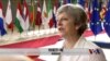 英首相称脱欧后将给欧盟居民“公平”待遇