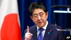 资料照片：日本前首相安倍晋三。(2017年9月25日)