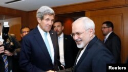 Держсекретар США Джон Керрі і міністр закордонних справ Ірану Мохаммад Джавад Заріф у Швейцарії