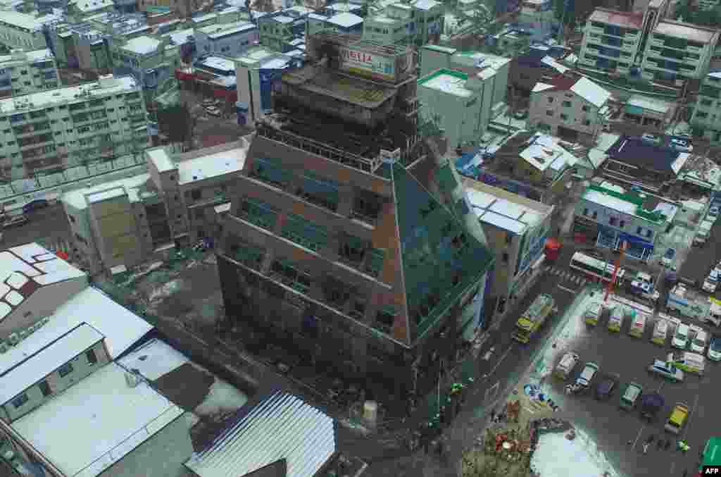 This general view shows an eight-storey building damaged in a blaze which killed 29 people and injured 29 others in the southern city of Jecheon, South Korea.