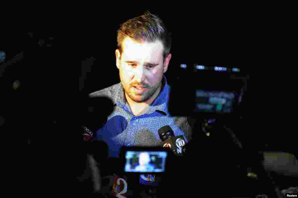 Chris Nault, cựu đồng đội trong đội bóng rugby với phóng viên Mỹ Steven Sotloff phát biểu trong buổi cầu nguyện tại Đại học Central Florida ở Orlando, Florida, ngày 3/9/2014.