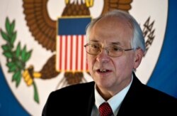 FILE - Then-U.S. special envoy to South Sudan Donald Booth speaks to the media in Juba, South Sudan, Dec. 31, 2013. Booth was appointed U.S. special envoy to Sudan six weeks ago.