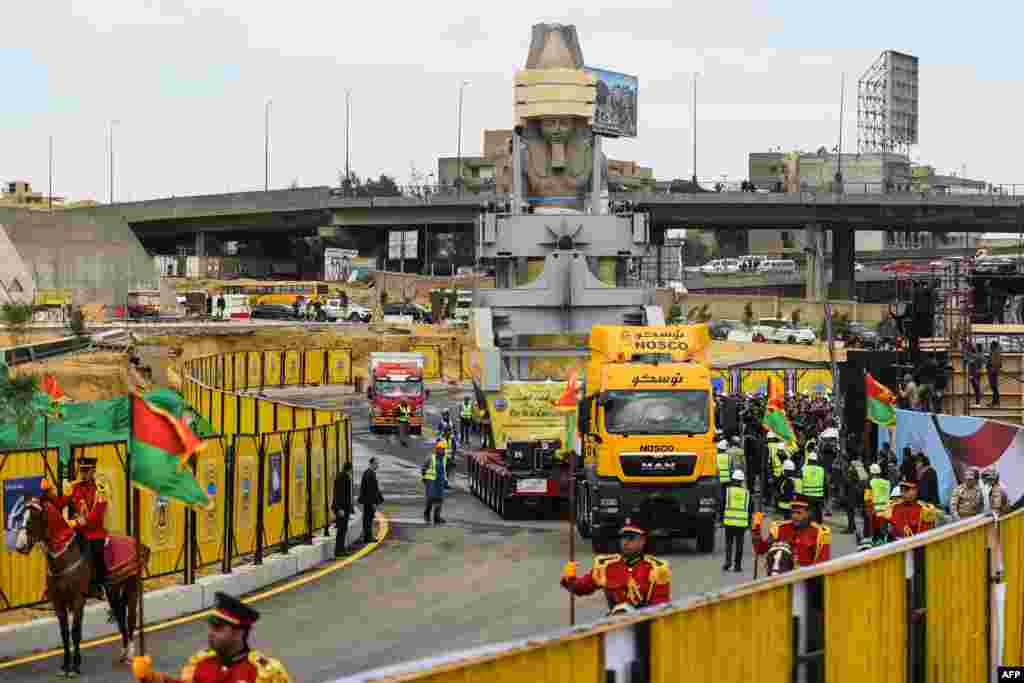 The 3,200-year-old-colossal statue of King Ramses II is transferred to the main entrance of the Grand Egyptian Museum in Cairo's twin city Giza, Egypt.