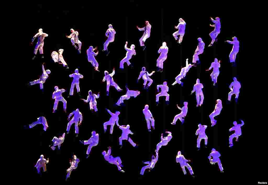 Aerobatic dancers under the direction of Spanish theatrical company La Fura dels Baus perform in "The Rise of the Tritons" during the opening of Valletta 2018, European Capital of Culture, in Valletta, Malta, Jan. 20, 2018.