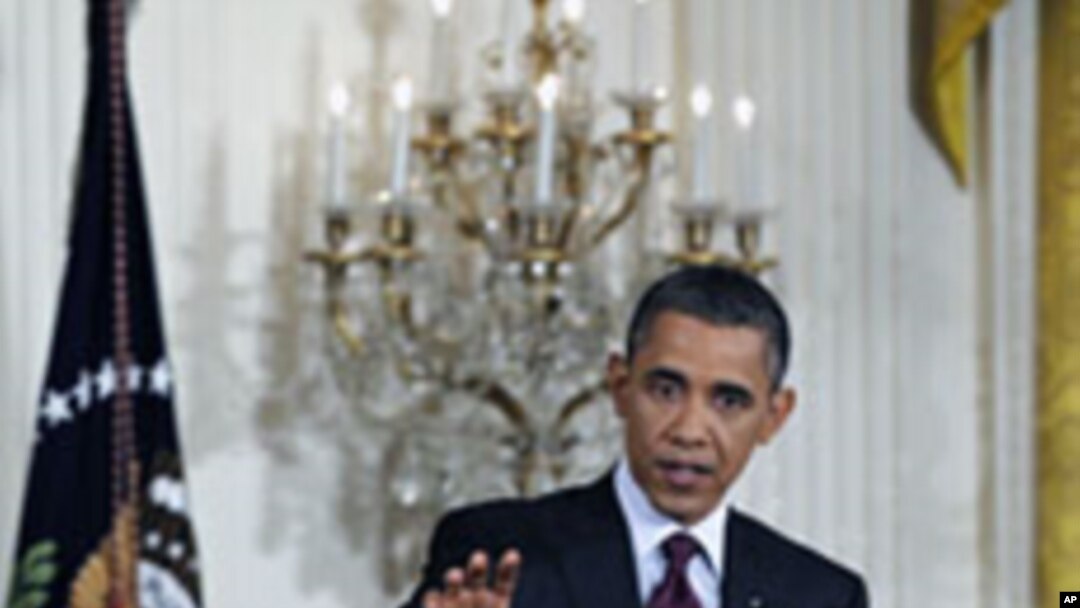 Shugaban Amurka Barack Obama yana masa tambayoyi a taron manema labarai,