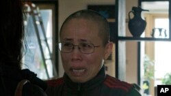 诺贝尔和平奖得主刘晓波去年因癌症病逝后，其遗孀刘霞一直遭中国政府软禁（资料照片）