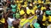 Mourners sing at Rufaro stadium, in Mbare township where the body of Zimbabwe's founder Robert Mugabe will lie in state, Harare, Zimbabwe, Sept. 12, 2019.