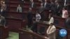 Hong Kong Chief Executive Walks Out of Legislature Amid Jeers