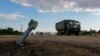 Архівне фото: російська військова машина в Чорнобаївці, літо 2022. REUTERS/Alexander Ermochenko