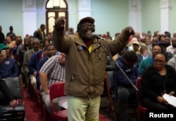 A man speaks as the Constitutional Review Committee hold public hearings regarding expropriation of land without compensation in Pietermaritzburg, South Africa, July 20, 2018.