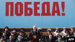 Президент Росії Путін під час промови на параді до 9 травня на Красній площі. Photo by Mikhail KLIMENTYEV / POOL / AFP