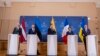 Міністр закордонних справ України Дмитро Кулеба (праворуч) під час спільної пресконференції з главами МЗС Латвії Кріш’янісом Карінсом (л), Естонії – Маргусом Цахкною, Литви – Габріеліусом Ландсбергісом, Франції – Стефаном Сежурном у МЗС Литви, Вільнюс, 8 березня 2024 р. (AP)