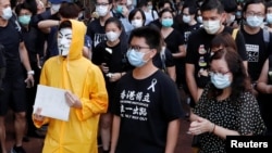 人称“第二代美国队长”的马俊文（图中）2020年出席悼念梁凌杰 逝世的活动。