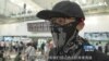 香港抗议者将暴力行为归咎于政府