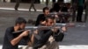 Shi'ite volunteers from Tal Afar, Iraq take part in a military training to fight against militants of the Islamic State in Kerbala Sept. 27, 2014. 