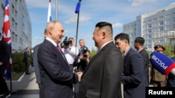 Лідери Північної Кореї та Росії на космодромі "Східний" в Амурській області, Росія, 13 вересня 2023 року. Аналітики говорять про “нову Холодну війну на Сході”, де по один бік Північна Корея з Китаєм та Росією, а по інший – США, Південна Корея та Японія. 