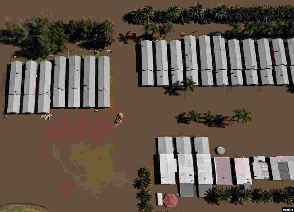 Flooding is seen at the Hawkesbury River northwest of Sydney in Wisemans Ferry, Australia. More than 40,000 residents have been forced to flee their homes as torrential rain sparked dangerous flash floods in Sydney's western regions.