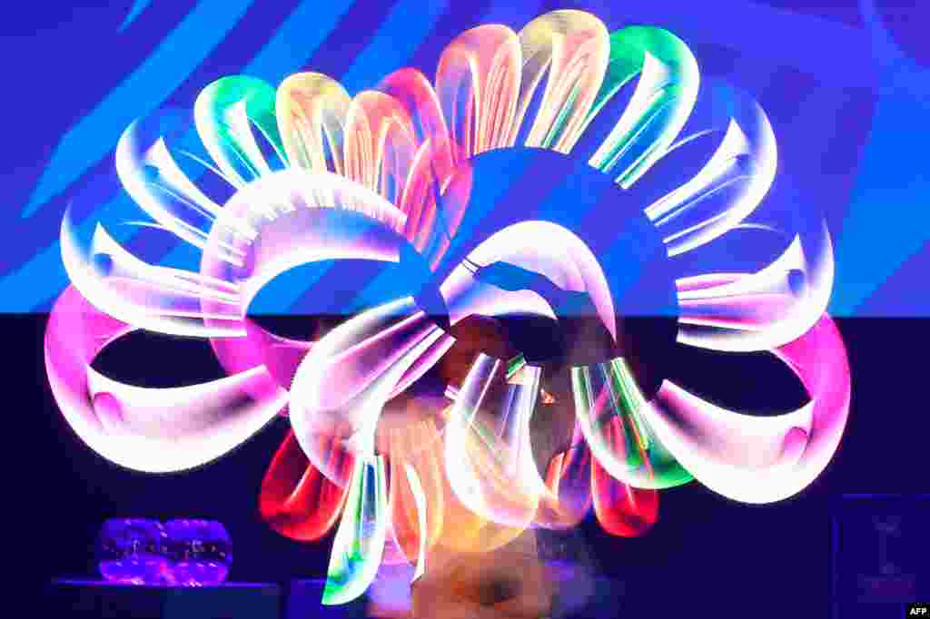 An artist performs on stage during the FIFA U-20 Women’s World Cup France 2018 draw ceremony in Rennes, western France.