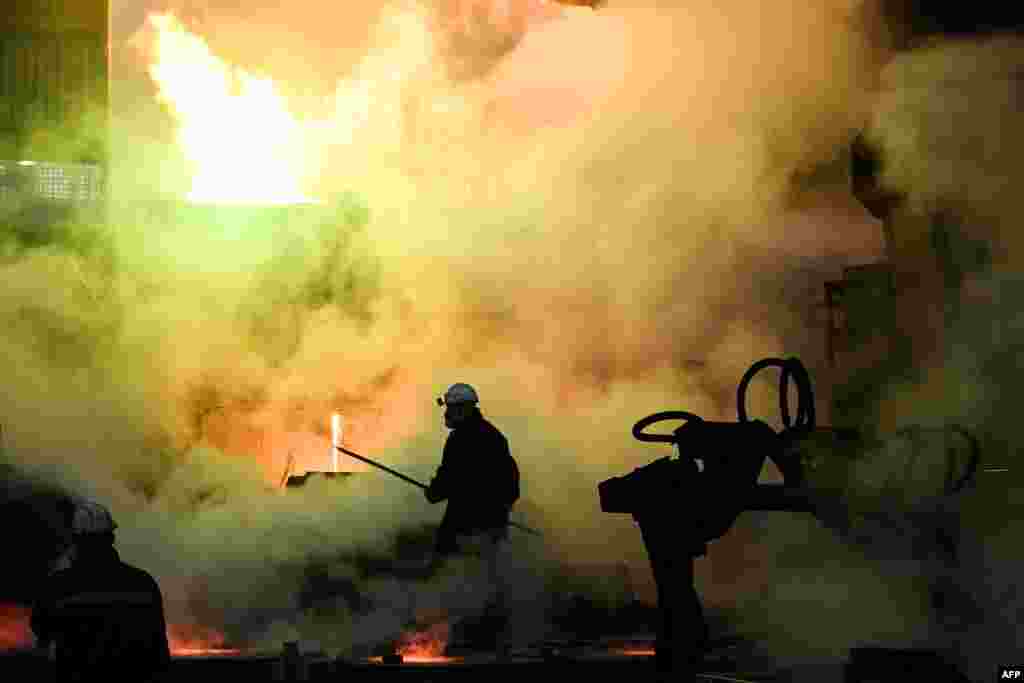 A worker is seen at the metallurgical workshop at Kola Mining and Metallurgical Company (Kola MMC), a unit of Russia's metals and mining company Nornickel, in the town of Monchegorsk in the Murmansk region.