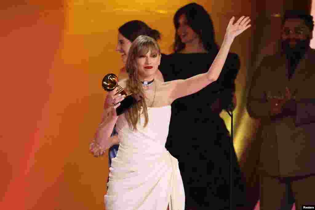 Taylor Swift accepts the award for Album of the Year for Midnights during the 66th Annual Grammy Awards in Los Angeles, California, Feb. 4, 2024.&nbsp;